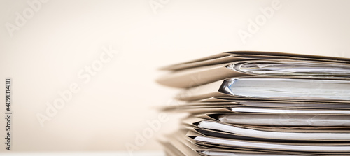 Extremely Close up Stack of Documents Folders on Office Desk Waiting to be Completed