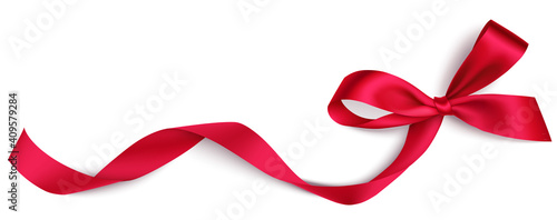 Decorative red bow with long red ribbon isolated on white background. Holiday decoration for Christmas or Valentines day sale design. Vector stock illustration 