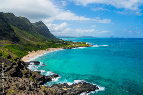 Rocky shoreline and pocket beach at Makapuʻu Point, western end of Oahu, Hawaii