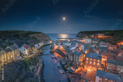 Moonrise over the North Yorkshire fishing village of Staithes.