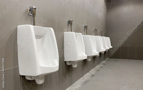 Men's white urinals design, Close up row of outdoor urinals men public toilet, Designing for men, Male-only service area..,Urinal concept.