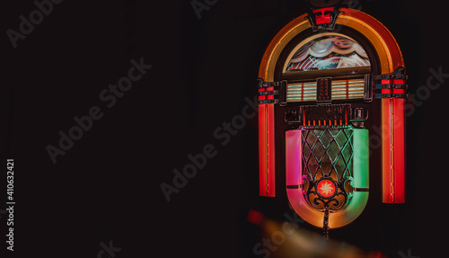 Retro jukebox on black background