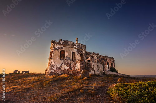 Sant'Antioco place old lighthouse of Capo Sperone on sunset