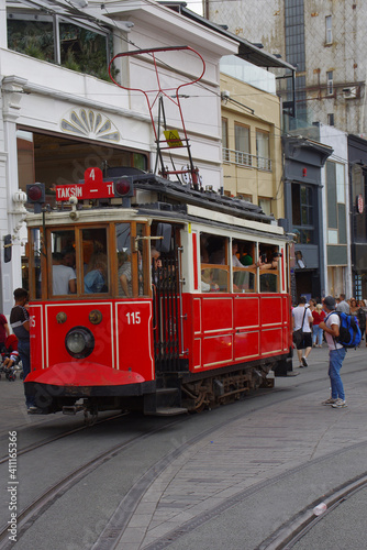 Istanbul - Turkey - The famous red tram in Taksim square, attraction for many tourists.