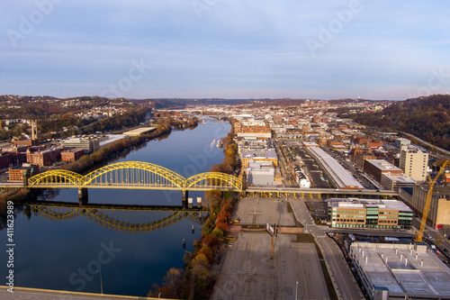 Aerial view of Pittsburgh, Pennsylvania's Strip District (right). The David McCullough 16th Street Bridge crosses the Allegheny River from Troy Hill (left).
