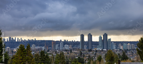 Burnaby, Vancouver, British Columbia, Canada. Beautiful Panoramic Aerial View of a modern city during a stormy and rainy day. Cityscape Buildings