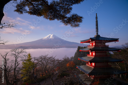 Rare scene of Chureito pagoda and Mount Fuji with morning fog, Japan in autumn