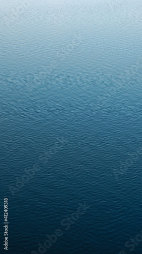 Vertical photography of a calm water surface