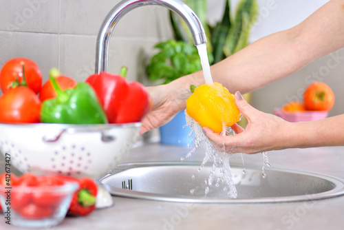 Washing vegetables. 