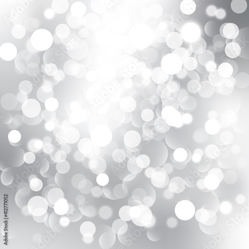 abstract bokeh light with silver background vector