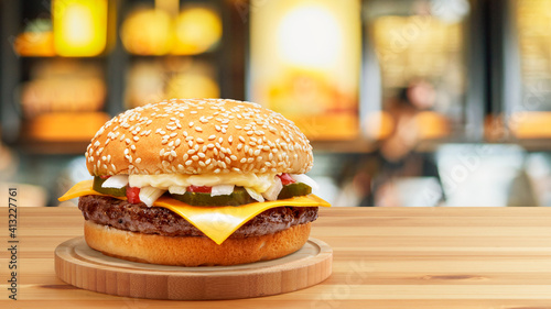 Delicious Cheese Beef Burger consists of Bun Bread Patty Pickle Onion Mayonaisse Ketchup Cheddar Cheese and lettuce in a yellow background with interactive 3D text for Modern Fast Food Restaurant