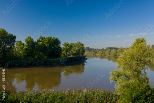 90 degree turn on Scheldt river, in Moerzeke, Hamme, Belgium - Aerial view