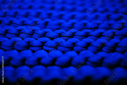 ultramarine blue background large knitted thread pattern