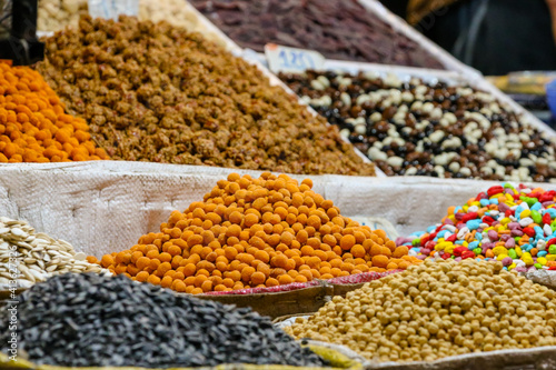 Nuts, dried fruits and spices in the souks of Marrakech in Morocco