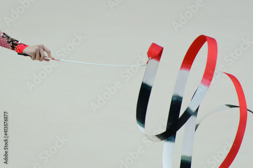 Female keep a rhythmic gymnastics ribbon