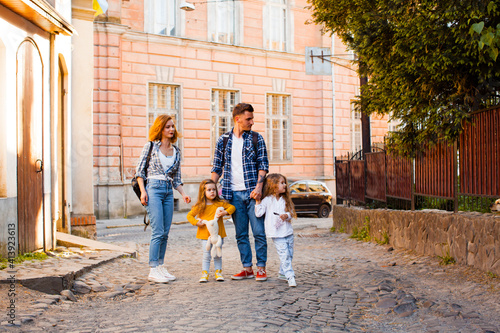 Uzhhorod downtown excursion of young family and their small kids