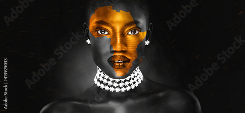 an africa symbol image on the beautiful african face of a young woman