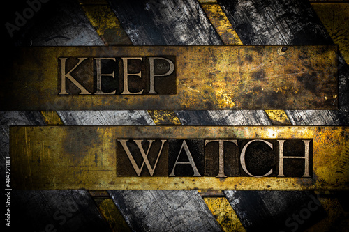 Keep Watch text on vintage textured grunge copper and gold background