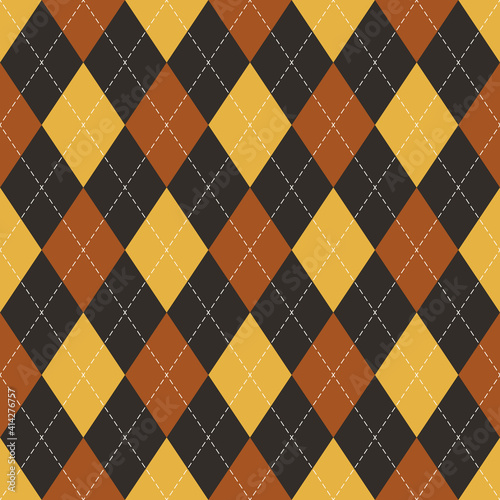 Argyle pattern autumn geometric in brown and yellow. Traditional stitched vector argyll dark background art for gift wrapping paper, socks, sweater, jumper, or other trendy fashion textile print.