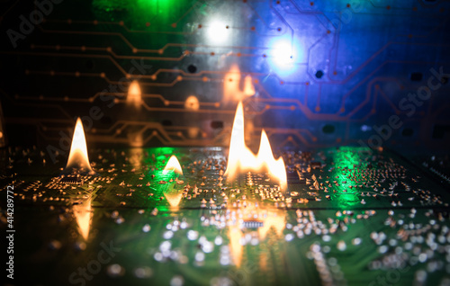 Burning microcircuit of complex electronic equipment. Factory breakdown concept.