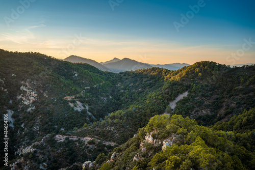 Mountainous landscape with pine tree and cork oak forests in the Sierra de Espadán Natural Park, Region of Valencia, Spain.