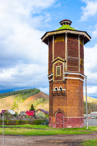 Historical brick water-pressure tower on the 4130 km of the Trans-Siberian Railway. Zykovo station at Krasnoyarsk Krai, Russia