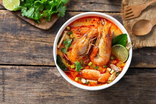 Tom Yam Kung ,Prawn and lemon soup with mushrooms, thai food in white bowl top view