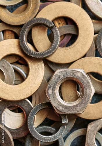 Nut and washer top view, close up, shallow depth of sharpness