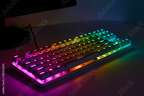 Gaming keyboard with RGB light. White mechanical keyboard with backlight