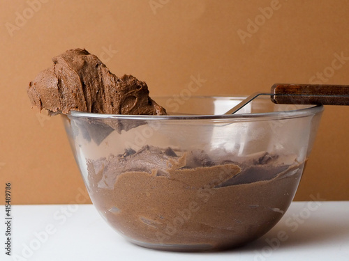 bowl of chocolate buttercream frosting 