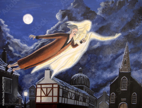 The Ghost of Christmas Past soars over the city with Ebenezer Scrooge in tow. 