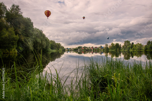 hot air balloon over river