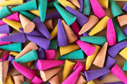 Background of colorful aroma incense cones top view