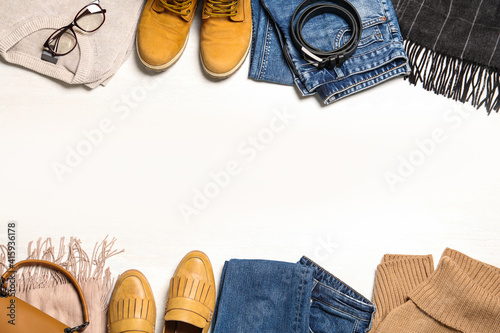 Flat lay composition with stylish clothes and accessories on white background. Space for text
