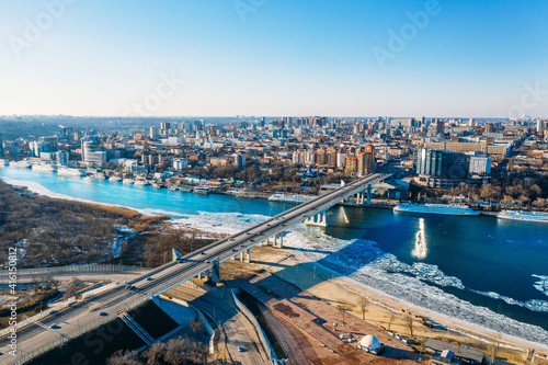 Voroshilovskiy Bridge above Don river and Rostov On Don aerial panoramic view of beautiful winter Russian city.