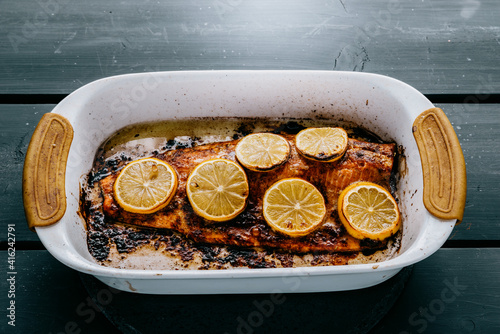 Salmon baked with lemon slices and soy