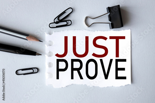 just prove. text on white paper on gray background