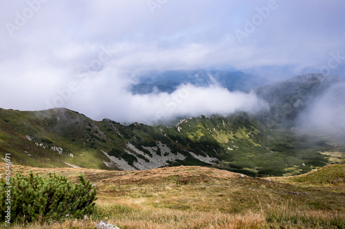 landscape in the mountains with clouds