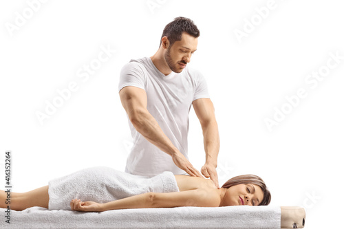 Masseur giving massage to a woman