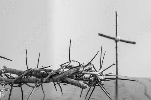 black and white crown of thorns and cross