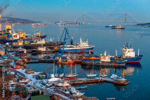 port of vladivostok city with ships in winter from Cape Egersheld