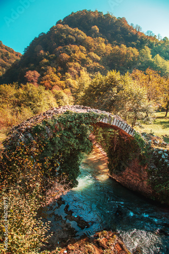 The picturesque old Besletsky bridge (or the bridge of Queen Tamara) in autumn.