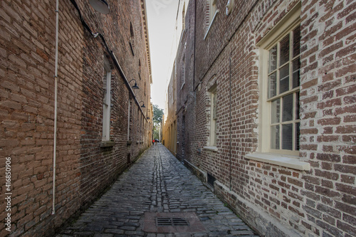 Lodge Alley in Charleston, South Carolina is one of city's few remaining cobblestone streets. Charleston is famous for it's hidden and secret alleyways and this one dates back to the early 1700s.