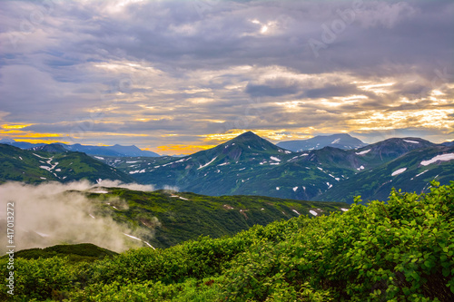 mountain landscape: sunset on a cloudy evening. Kamchatka Russia