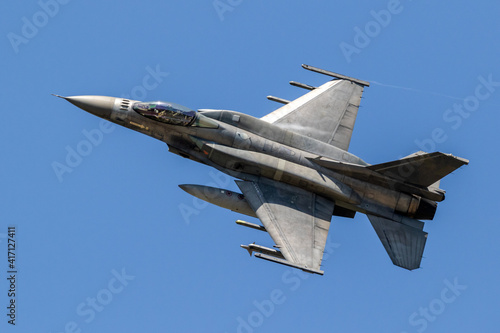 Air force fighter jet plane in full flight.