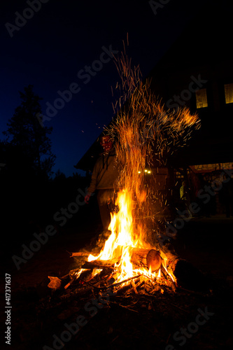 Large bonfire burning at night, Lek Reczynski, Lodz Voivodeship, Poland