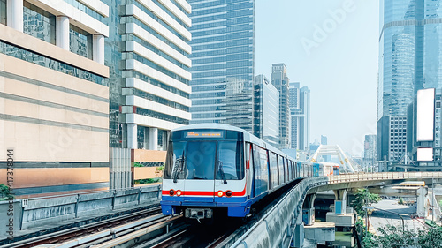 skytrain mass transit with cityscape.