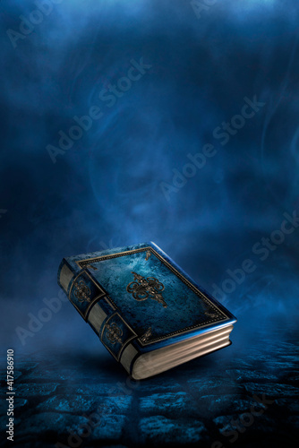 Magic vintage fantasy book on a dark background, landscape, smoke, fog, neon moonlight in the dark. 3D illustration. 