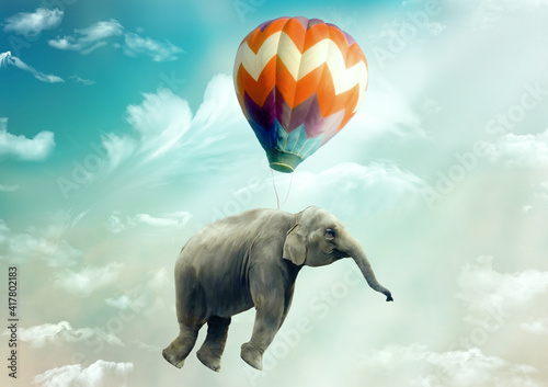 Huge Elephant floating or flying with air balloon with sky and clouds background. Fantastic surreal fantasy phantasmagoric illustration. Freedom concept. Imagination. Surrealism. Dream