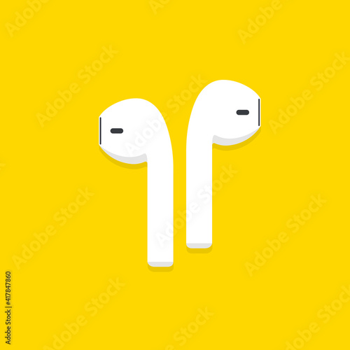 Wireless headphones on yellow background.